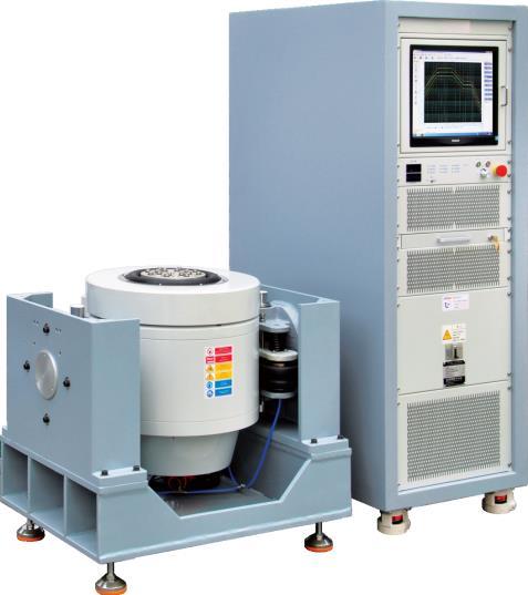 Electrodynamic vibration test system with shaker and amplifier cabinet. Representative catalog photograph.